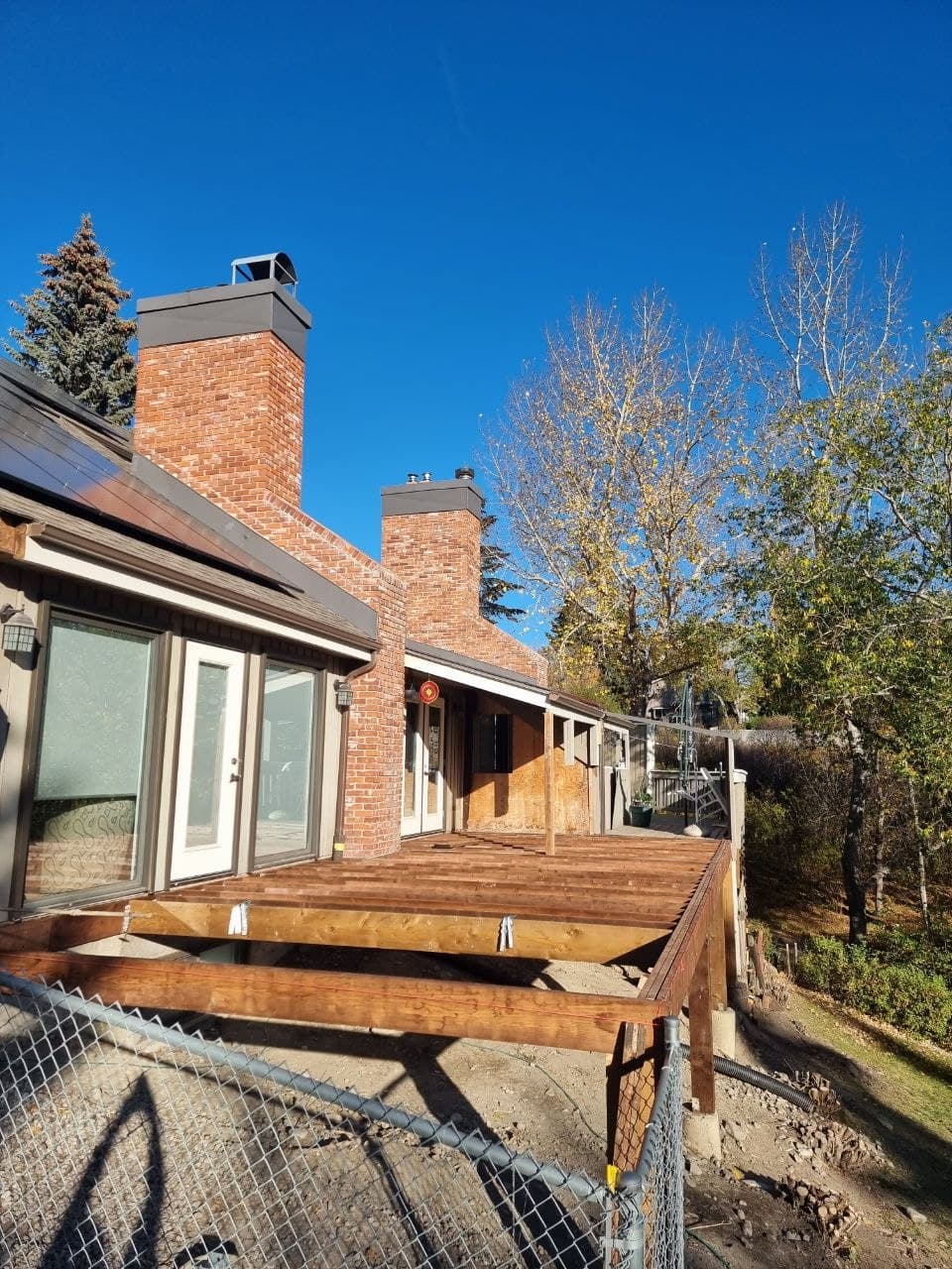 New deck framing and beams during a Calgary deck rebuild